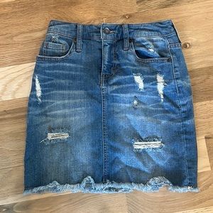 Distressed, stretchy denim skirt